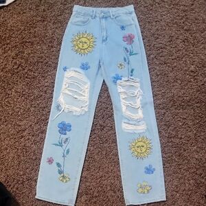 SHEIN Light Blue Jeans with Sun and Floral Embroidery